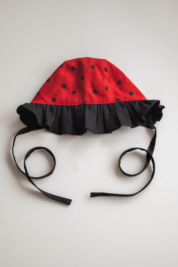 Linen Bonnet Ladybird With Ruffle